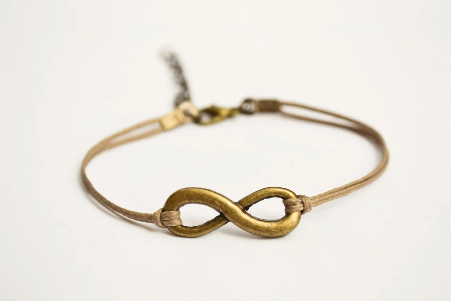 Infinity bracelet, brown cord bracelet with a bronze charm, yoga gift for her