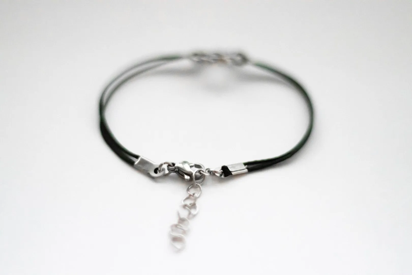 Karma bracelet, silver braided circle charm and black string, yoga jewelry